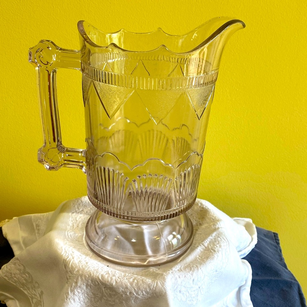 Antique etched glass pitcher, lavender hue. 5 cup capacity, scars, or markings.